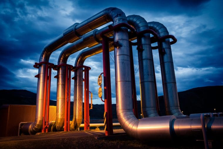 A geothermal energy pipeline at night